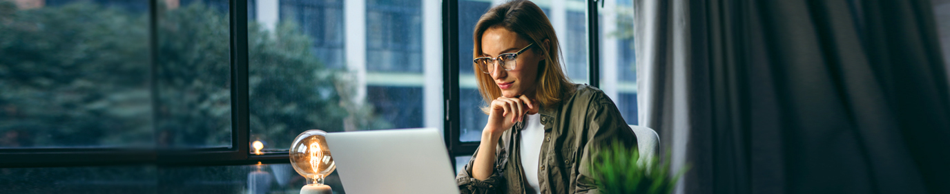 happy-man-with-notepads-laptop
